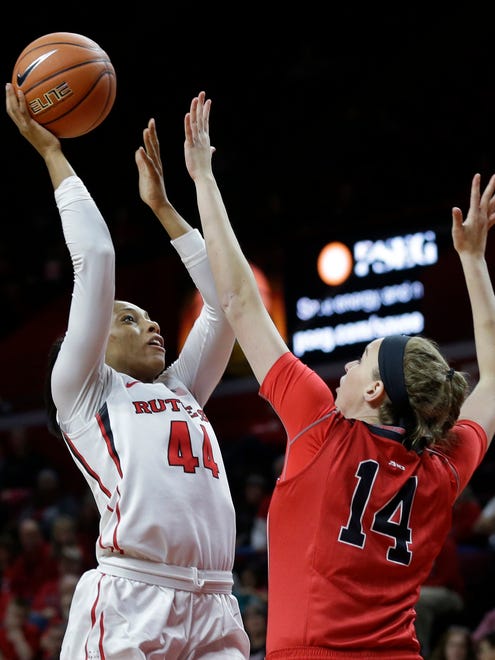 Rutgers’ Betnijah Laney shoots past Davidson’s Mellissa Giegerich during the first half Sunday in Piscataway, N.J.