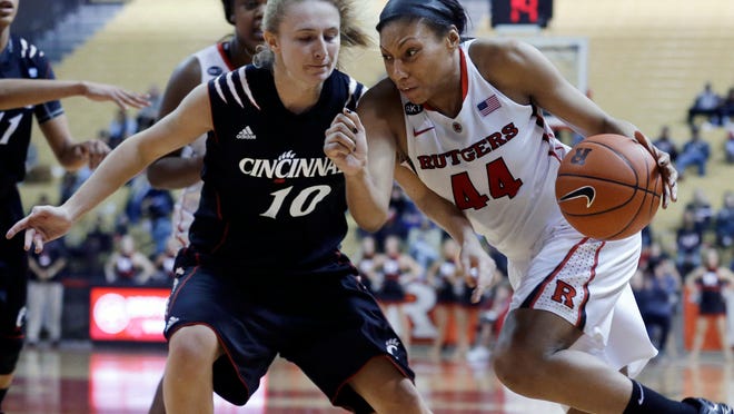 As a junior last season at Rutgers, Smyrna High graduate Betnijah Laney (right) averaged 11.8 points and 8.5 rebounds per game while recording 15 double-doubles.
