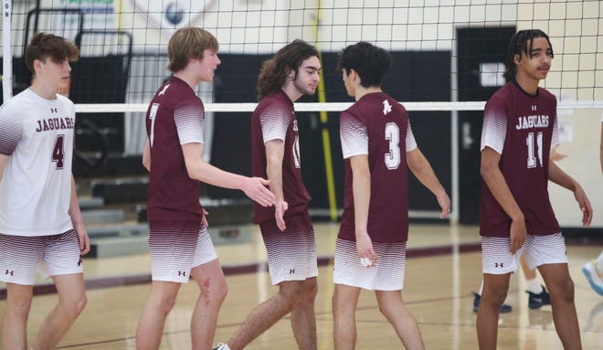Appoquinimink's (from left) Kevin Nowakowicz, Riley Buzby, Dylan Clark, Riley Ciria and Christian Luc celebrate during a their sweep of Delaware Military in the Jaguars' 3-0 win at Appoquinimink, Wednesday, March 27, 2024.