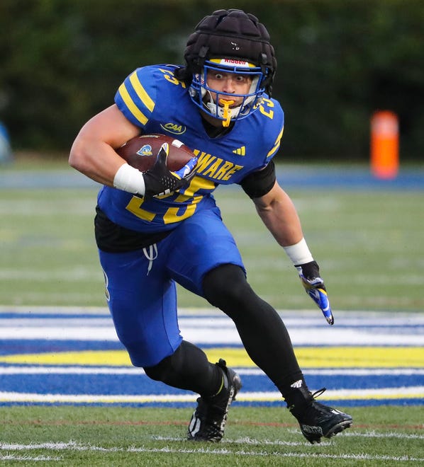 Delaware running back Kaelin Costello spots a hole during the Blue and White Spring Game at Delaware Stadium, Friday, April 19, 2024.