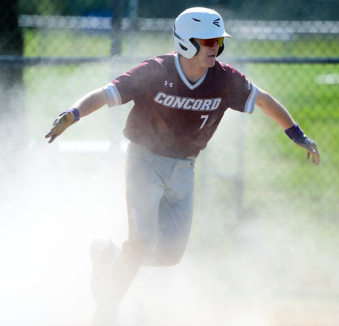 Concord's Dan Baxter scores the opening run of the game on a wild pitch in the second inning of Concord's 3-1 win at Brandywine High School, Tuesday, April 23, 2024.
