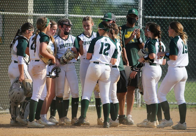 The Spartans come together after the final out in their 4-0 win over Charter School of Wilmington in the second round of the DIAA state high school tournament Wednesday, May 19, 2021 at St. Mark's High School.