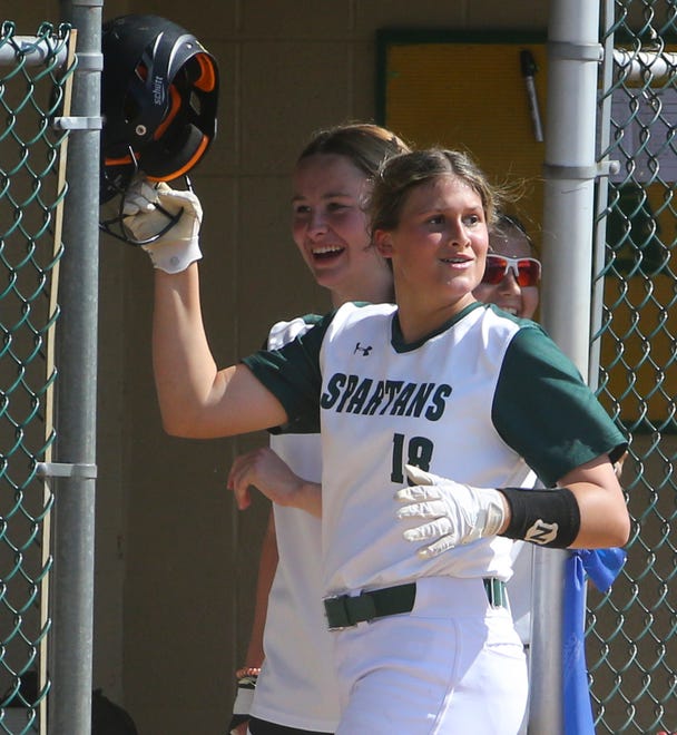 St. Mark's Pia Perrone returns to the dugout after scoring in the Spartans' four-run second inning in the Spartans' 4-0 win in the second round of the DIAA state high school tournament Wednesday, May 19, 2021 at St. Mark's High School.