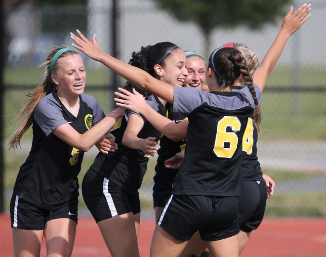 Padua's Brieana Hallo is the center of attention after she opened the scoring in the first half of Padua's 2-1 win against Smyrna in the DIAA Division I state tournament title game Tuesday, June 1, 2021 at Dover High School.