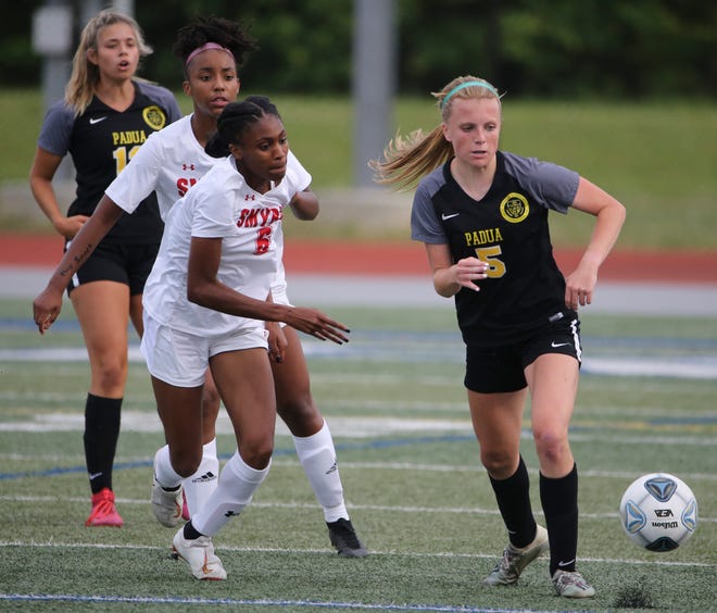 Smyrna's Kelly Barr (6) pursues Padua's Lauren Duffy in the second half of Padua's 2-1 win in the DIAA Division I state tournament title game Tuesday, June 1, 2021 at Dover High School.