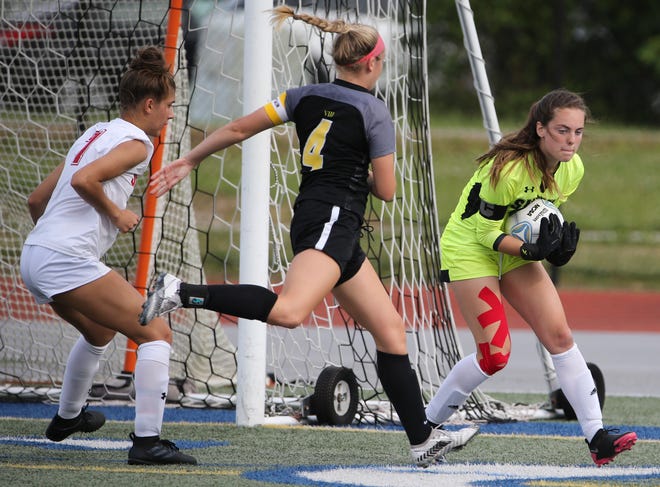 Smyrna goalkeeper Sofia Lerro pulls the ball in ahead of Padua's Sophia Marini in the first half of Padua's 2-1 win in the DIAA Division I state tournament title game Tuesday, June 1, 2021 at Dover High School.