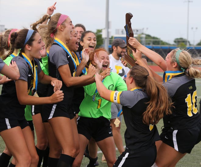 Padua receives the championship trophy after beating Smyrna 2-1 in the DIAA Division I state tournament title game Tuesday, June 1, 2021 at Dover High School.