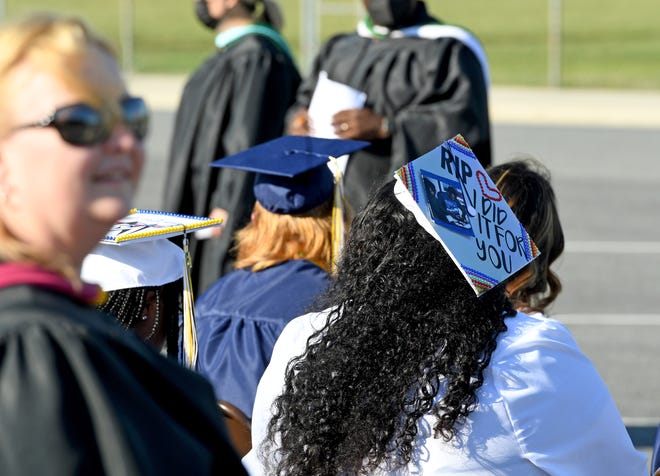 Seaford High School seniors wait for the start of commencement Monday, June 7, 2021, at Bob Dowd Stadium in Seaford, Delaware.