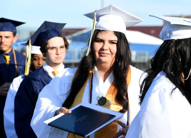 Seaford High School's Mia Baker-Espejo receives her diploma during commencement Monday, June 7, 2021, at Bob Dowd Stadium in Seaford, Delaware.