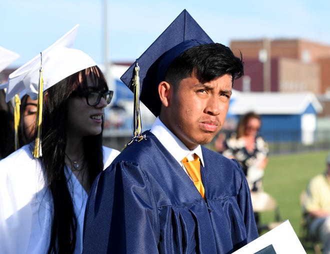 Seaford High School's Alvarado Denilson wait to cross the stage during commencement Monday, June 7, 2021, at Bob Dowd Stadium in Seaford, Delaware.