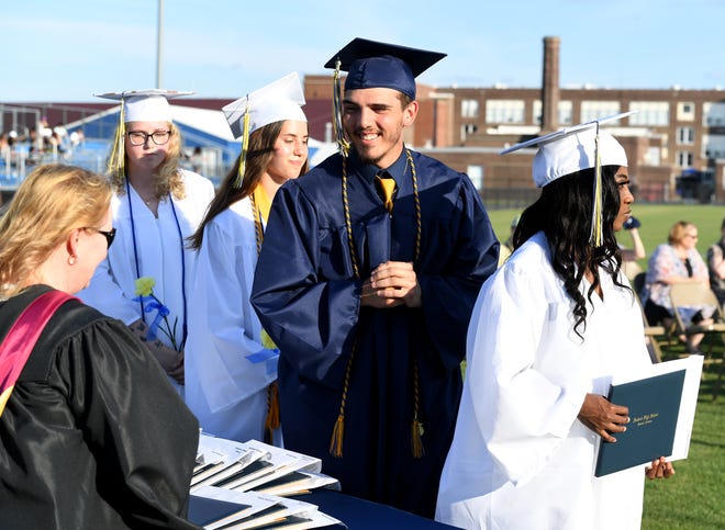 Seaford High School's Raymond Brady waits to cross the stage during commencement Monday, June 7, 2021, at Bob Dowd Stadium in Seaford, Delaware.