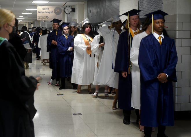 Seaford High School seniors inside for the start of commencement Monday, June 7, 2021, at Bob Dowd Stadium in Seaford, Delaware.