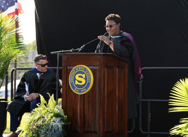 Seaford High School Principal Zulieka Jarmon-Horsey gives the welcome and introductions during commencement Monday, June 7, 2021, at Bob Dowd Stadium in Seaford, Delaware.