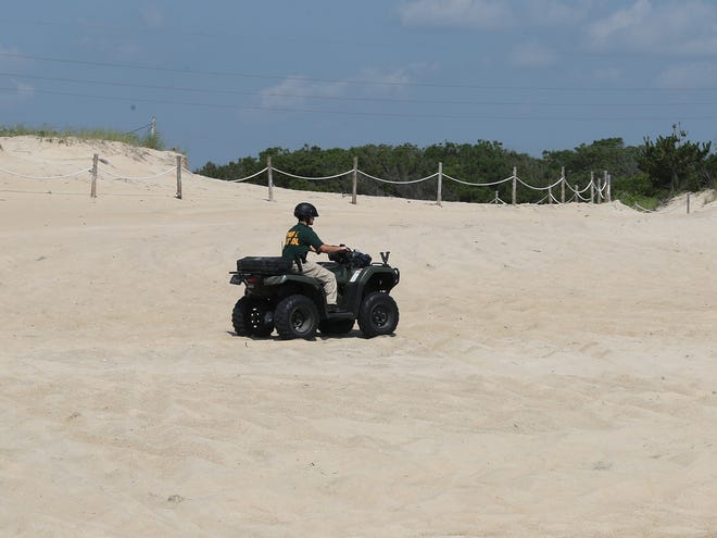 Beach patrol drives on the beach Friday, July 16, 2021, on Fenwick Island State Park in Fenwick Island, Delaware.