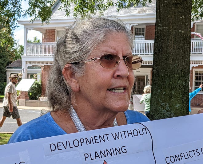 Nancy Flacco speaks about why she joined the Sussex2030 citizens' protest Tuesday, Sept. 21, 2021, before a Sussex County Council meeting in Georgetown, Delaware. The group was primarily focused on overdevelopment.
