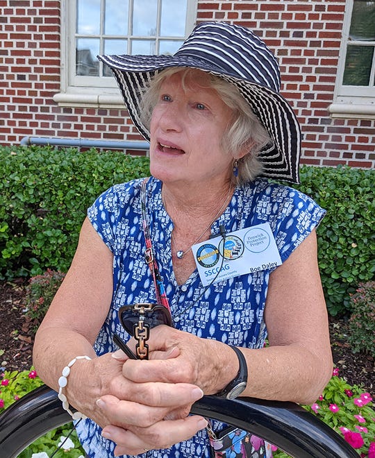 Boe Daley speaks about why she joined the Sussex2030 citizens' protest Tuesday, Sept. 21, 2021, before a Sussex County Council meeting in Georgetown, Delaware. The group was primarily focused on overdevelopment.