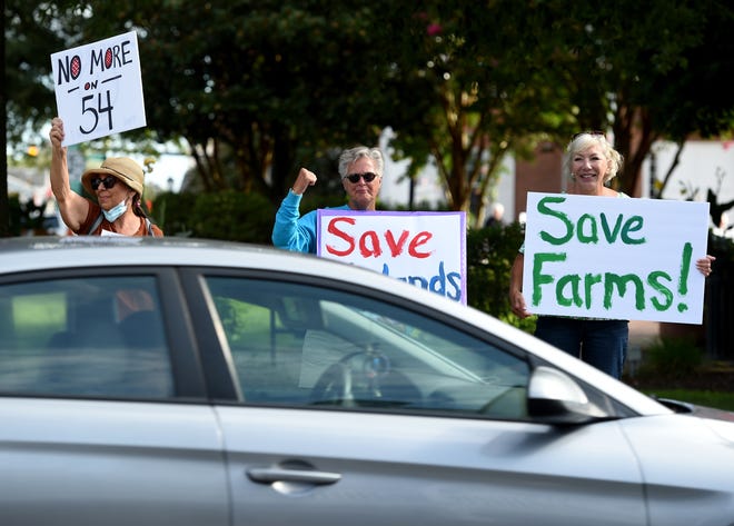 Sussex2030 held a citizens' protest Tuesday, Sept. 21, 2021, before a Sussex County Council meeting in Georgetown, Delaware. The group was primarily focused on overdevelopment.