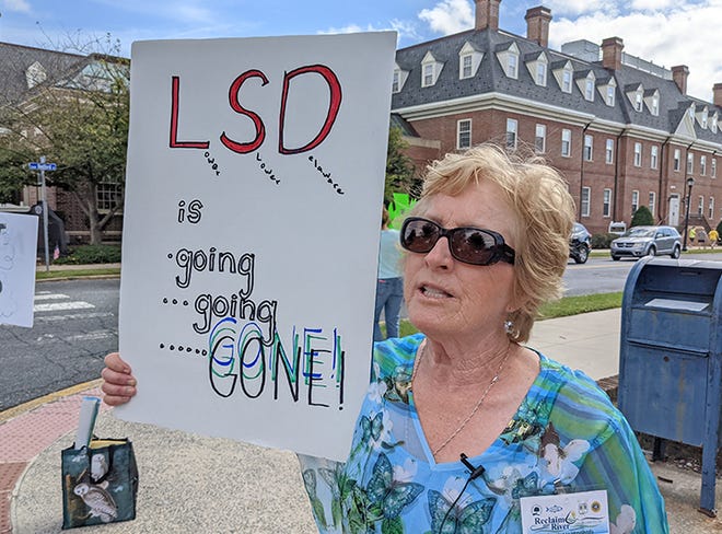 Nan Zamorski speaks about why she joined the Sussex2030 citizens' protest Tuesday, Sept. 21, 2021, before a Sussex County Council meeting in Georgetown, Delaware. The group was primarily focused on overdevelopment.